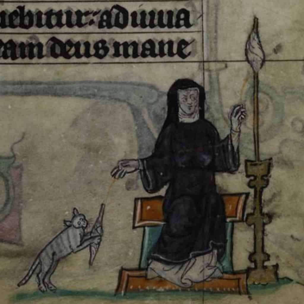 Medieval drawing of a nun playing with a cat.